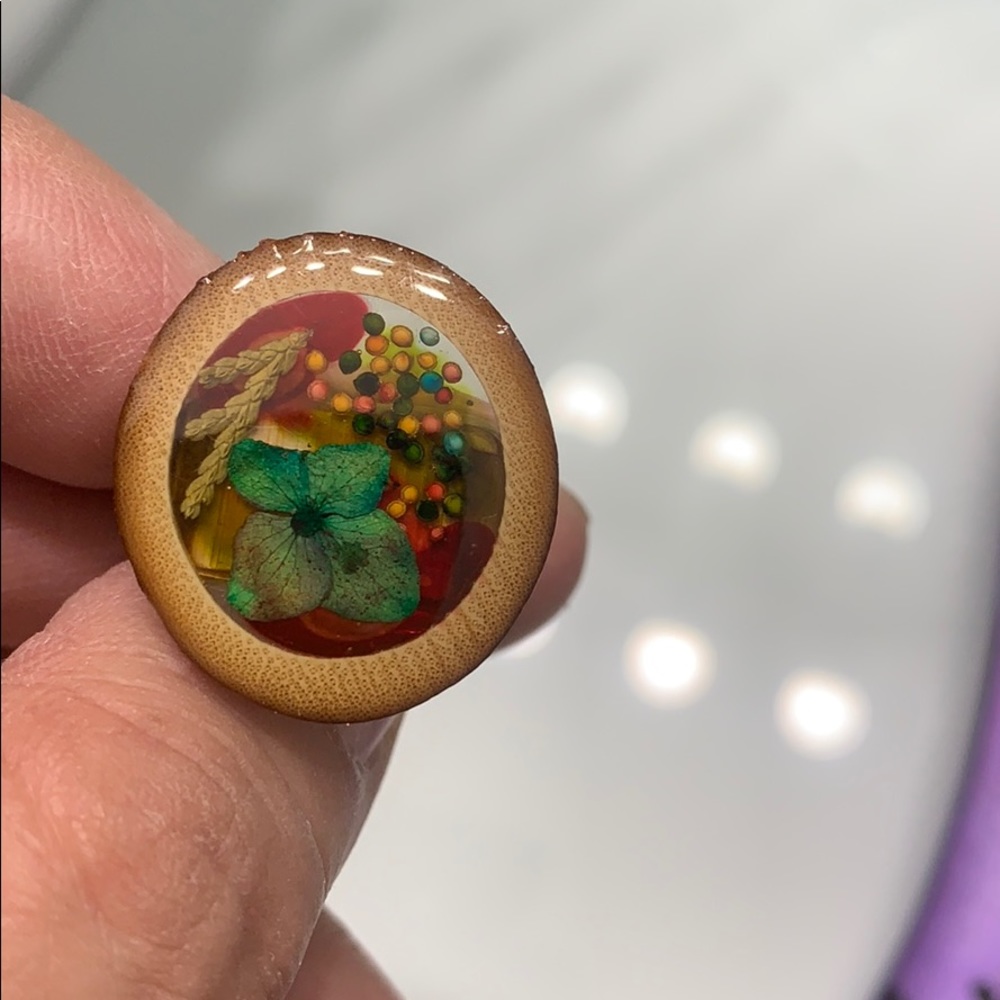 Wood ring with natural flowers craft